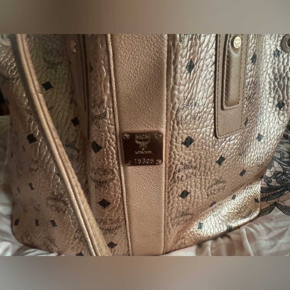 Gently Used 100% Authentic Metallic MCM Tote. Small stain shown $450 OBO